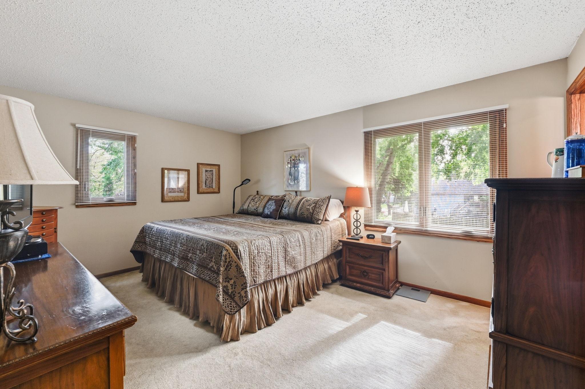 Spacious Primary Suite includes 3/4 bath and walk-in closet