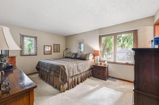 Spacious Primary Suite includes 3/4 bath and walk-in closet