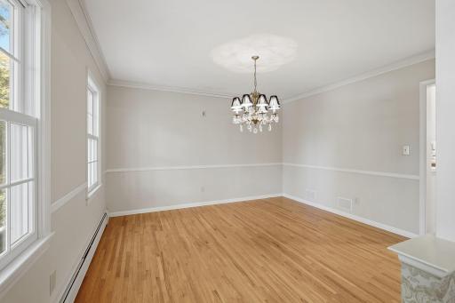 Spacious dining room has been freshly painted