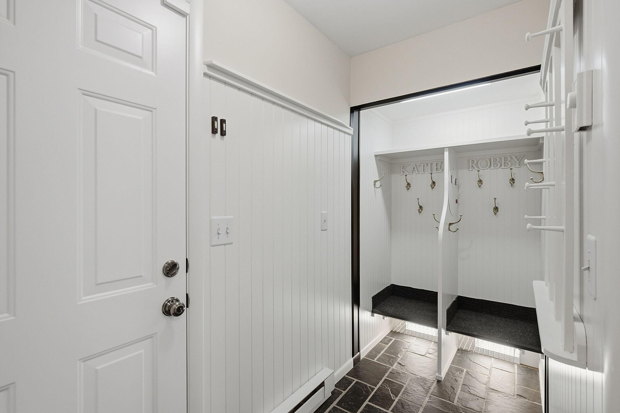 Back hall mudroom with cubbies to keep items organized