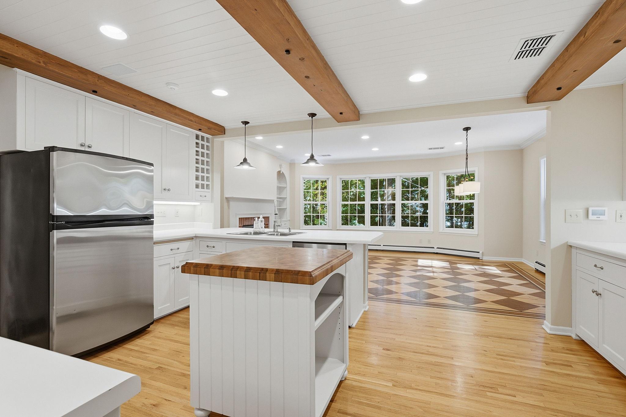 Kitchen flows easily into the adjoining family room