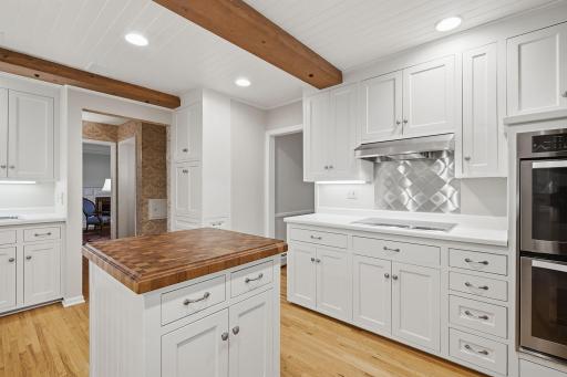 Bright and open kitchen layout provides ample space for prepping, cooking, and gathering