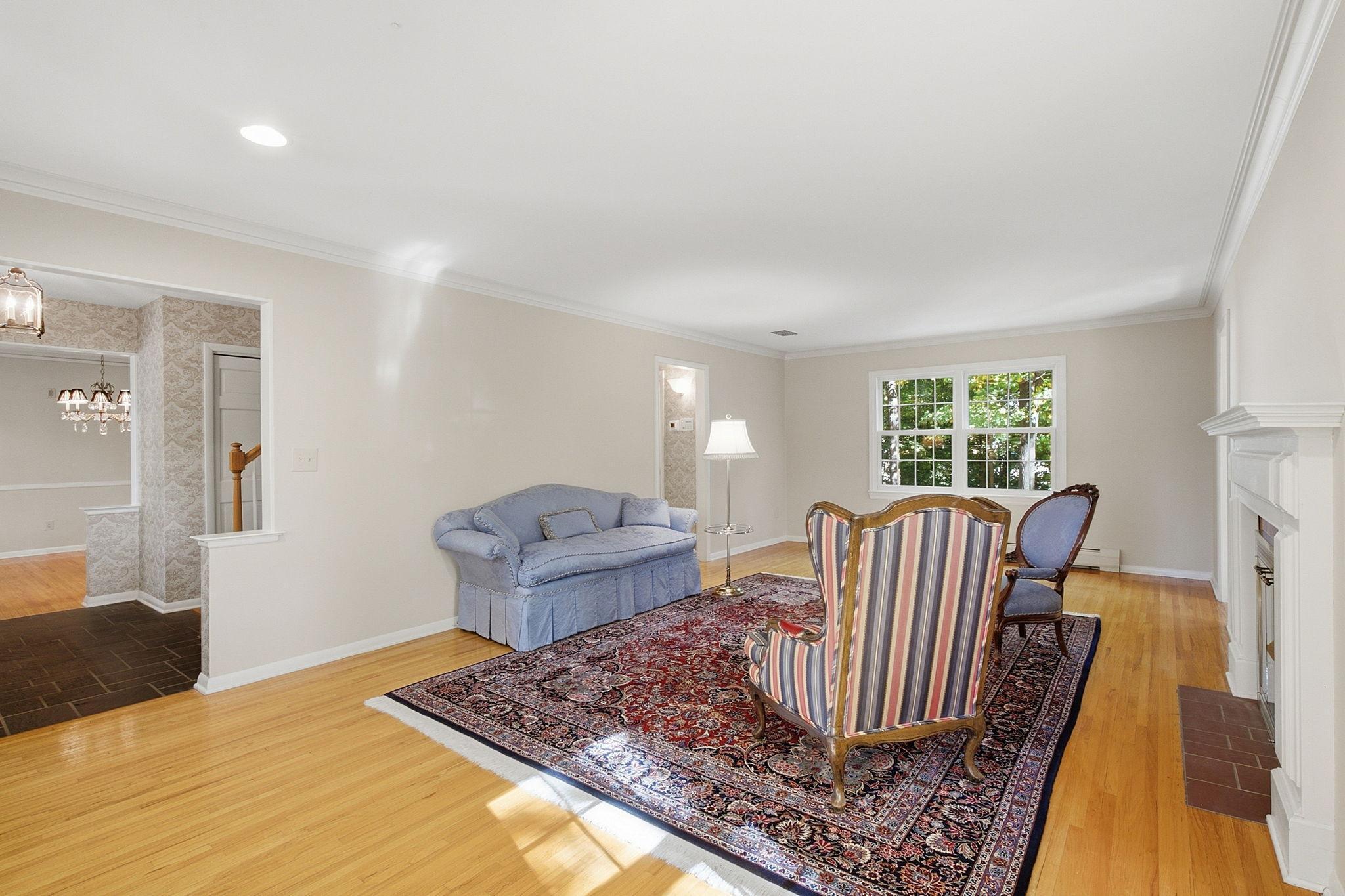 Formal living area is quite spacious with views of both front and back yards