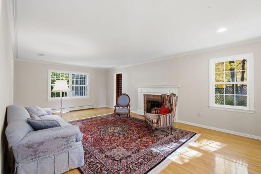 Freshly painted with gleaming wood floors carrying into this space