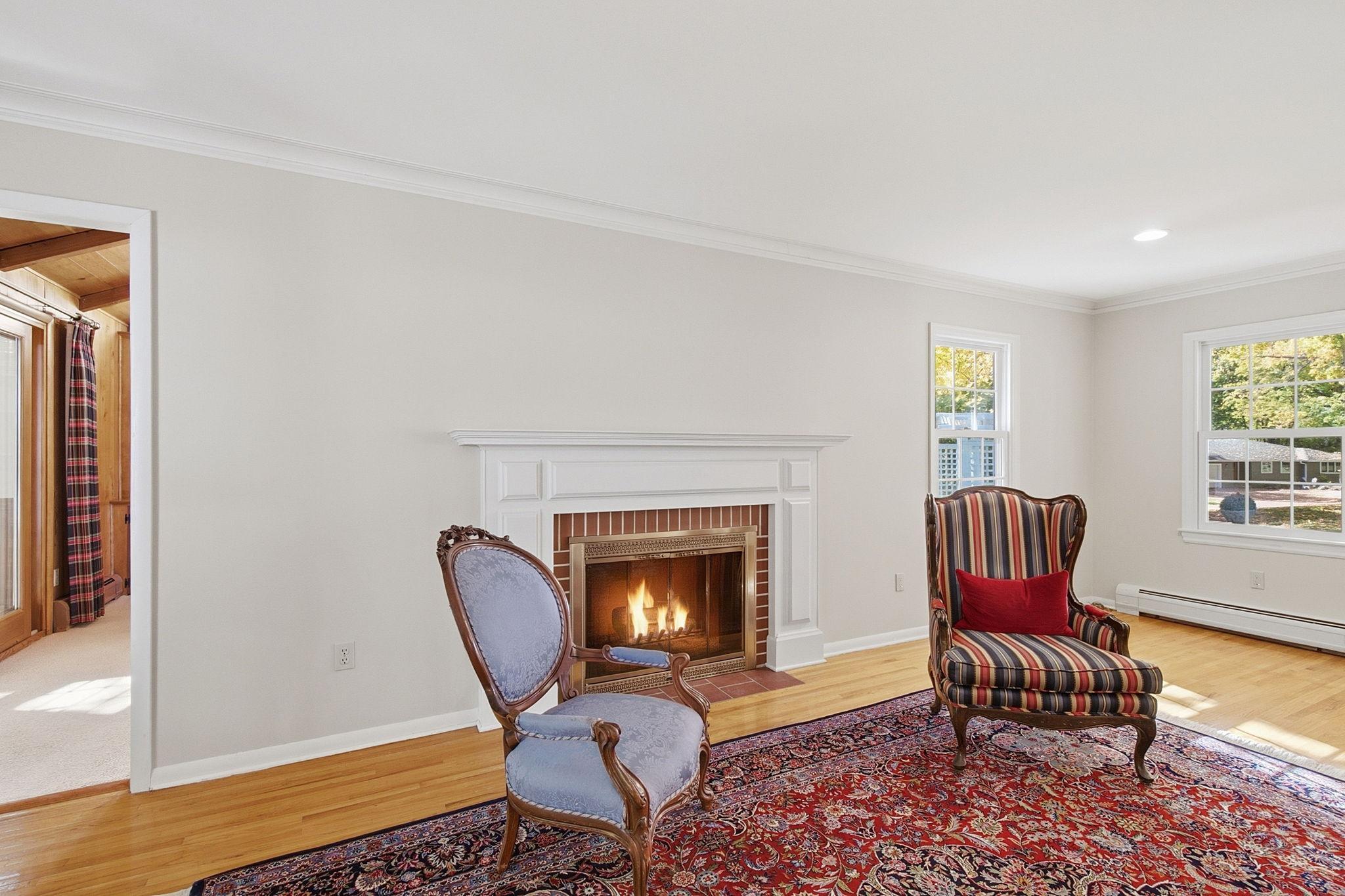 The fireplace offers an inviting ambiance to gather around