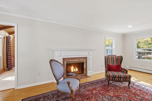 The fireplace offers an inviting ambiance to gather around