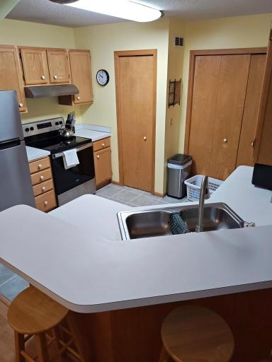 Breakfast bar. All new stainless appliances. New furnace, AC, water heater and softener! Ceramic tile floor. Closet holds laundry and a pantry.