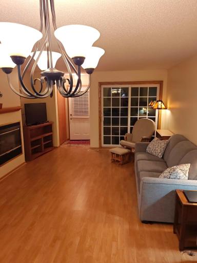 Beautiful wood laminate floor. Newer patio door and storm door