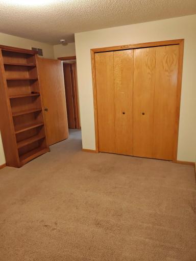 Second bedroom has two optional bookshelves