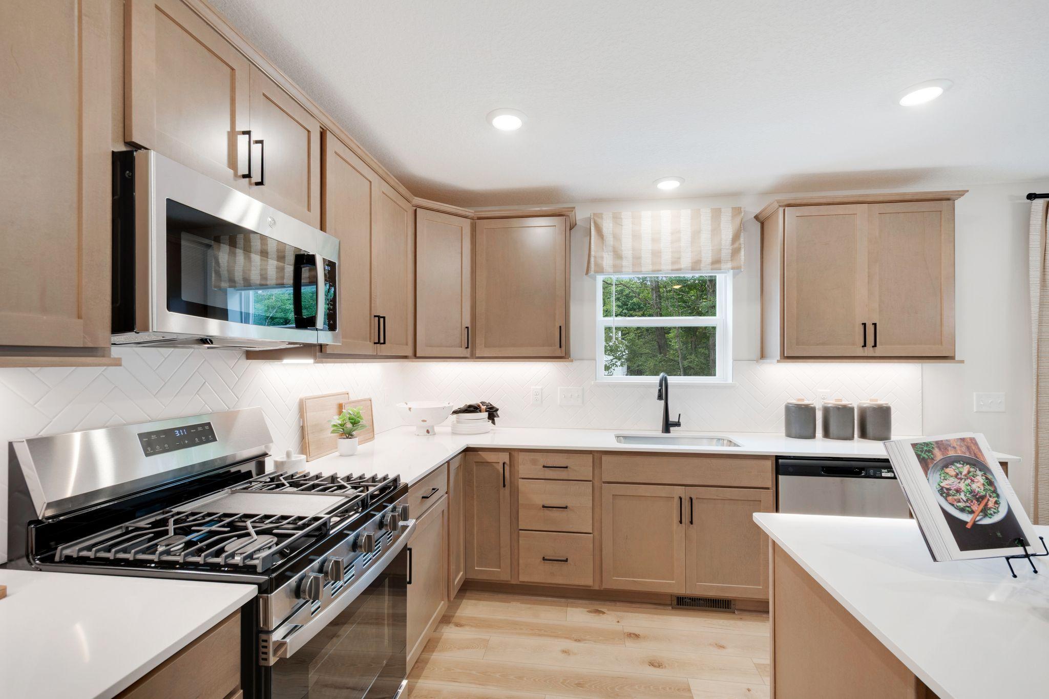 Kitchen - Home features the same interior color package shown here.