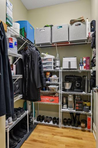 Large walk-in closet more more than your shoes and coats, plenty of room as a pantry items