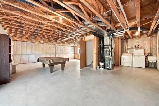 Furnace/utility room back in the corner to allow room for 2 additional bedrooms and a bathroom