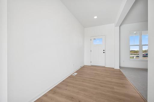 Step inside to a bright and welcoming entry that sets the tone for the rest of the home, feels both open and inviting from the moment you arrive. Home under construction, photo of similar home, selections vary.