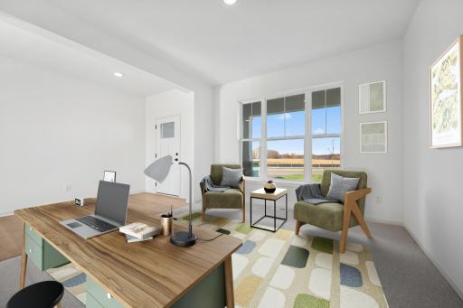 Filled with natural light, this versatile space is perfect for a home office, reading nook, or sitting area. Home under construction, photo of similar home, selections vary. (This is a virtually staged photo)