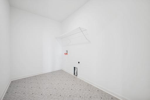 Laundry day is a breeze with the convenience of an upstairs laundry room near all the bedrooms. No more hauling clothes up and down stairs. Home under construction, photo of similar home, selections vary