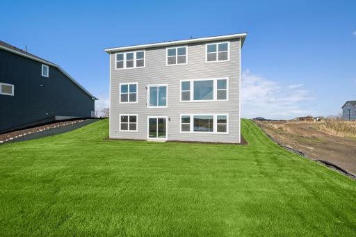 Imagine stepping outside to enjoy the open views and fresh air right from your back door. Home under construction, photo of similar home, selections vary.