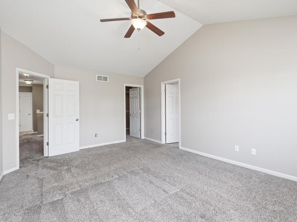 Primary features walk-in closet and large full bath