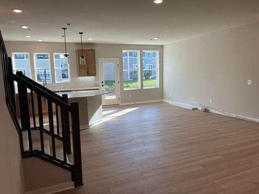 Main living area with gorgeous stair railing