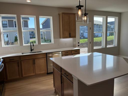Another view of the kitchen and backyard