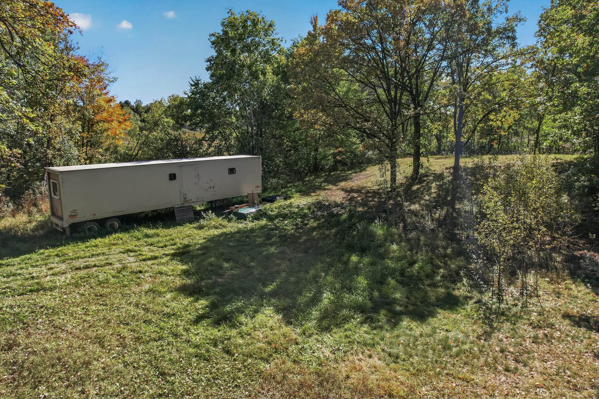 Seller working on getting trailer removed from property.