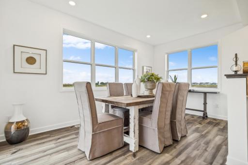 Welcoming dining area offering the perfect space for family meals, entertaining guests, and everyday gatherings! *Photo of Actual Home