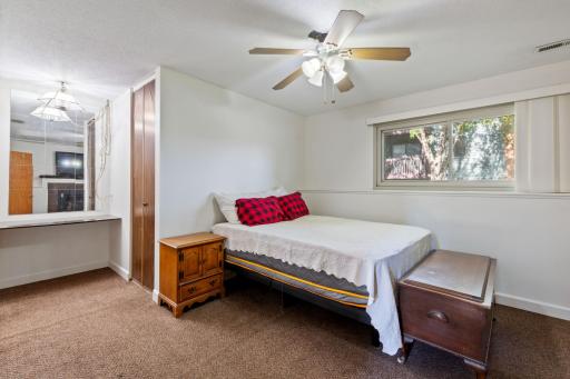 Primary bedroom with walk-in closet and bathroom ensuite