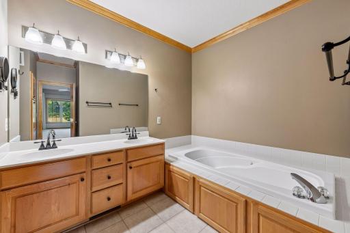 Primary full bath with separate tub and shower