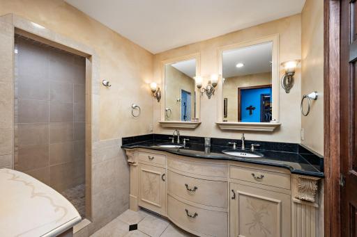 Heated floor, dual vanity and walk in shower in primary bath