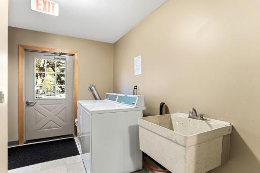 Shared laundry and utility sink right next to unit 3