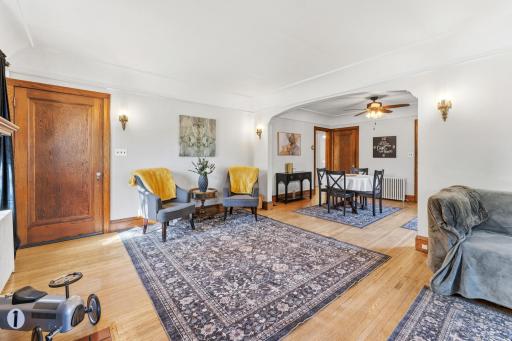 Open entertaining space with original hardwood floors