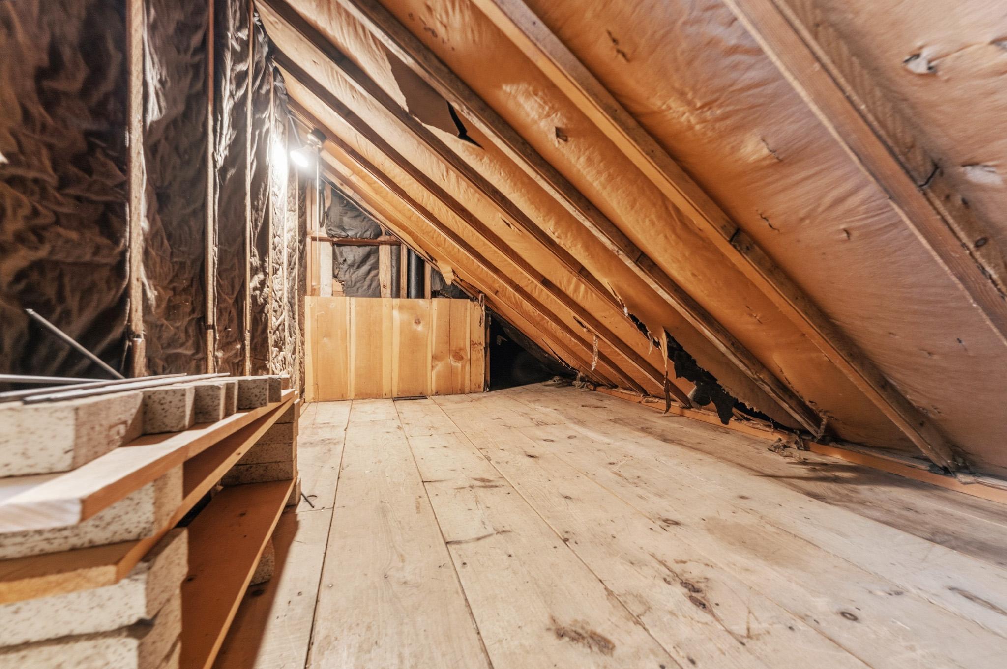 Long attic closet along upstairs hallway