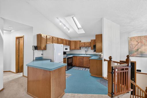 Flooring & cabinet updates do wonders! Lots of nice cabinets and good working space.