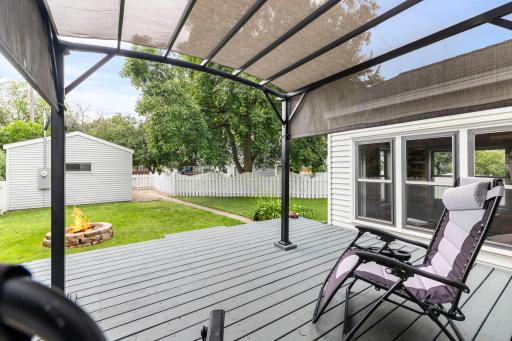 The spacious deck is ready for hosting and relaxing evenings outdoors.