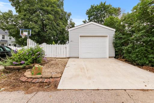 The extra deep detached garage provides more storage with built-in shelving, plus a Chamberlain garage door opener with myQ smart technology and EV charger compatibility.