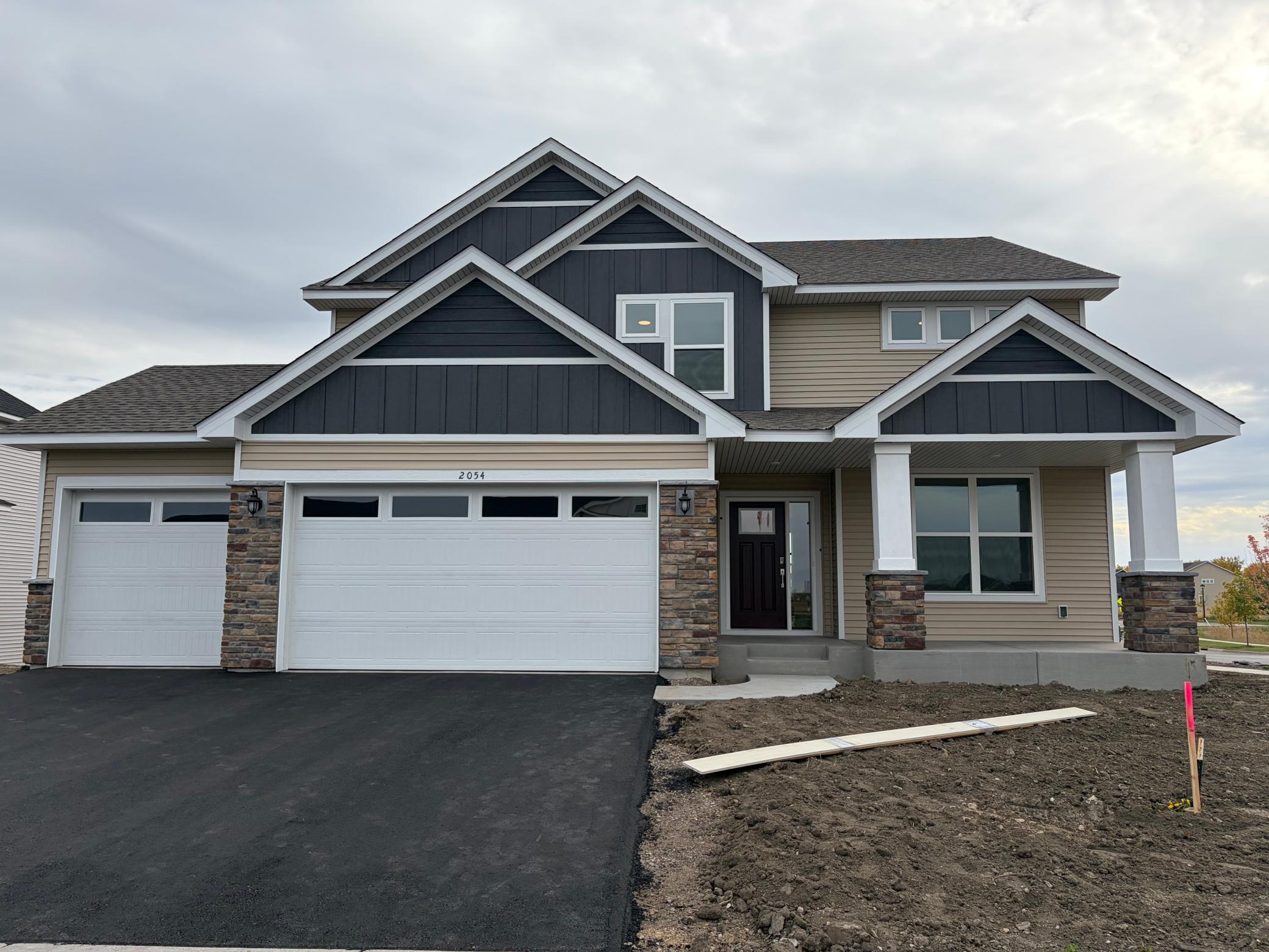 Welcome to 2054 Norway Ln! (Photo is of the actual home in progress.)