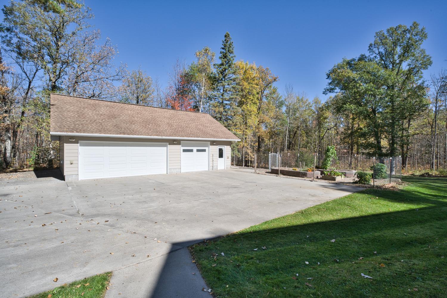 3 car garage & concrete driveway