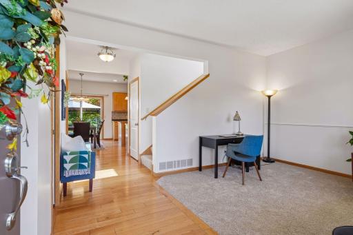 Enter from the front door into the living room or office space