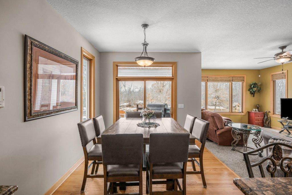Informal dining room off the kitchen. Sliding patio door leads to the covered deck!