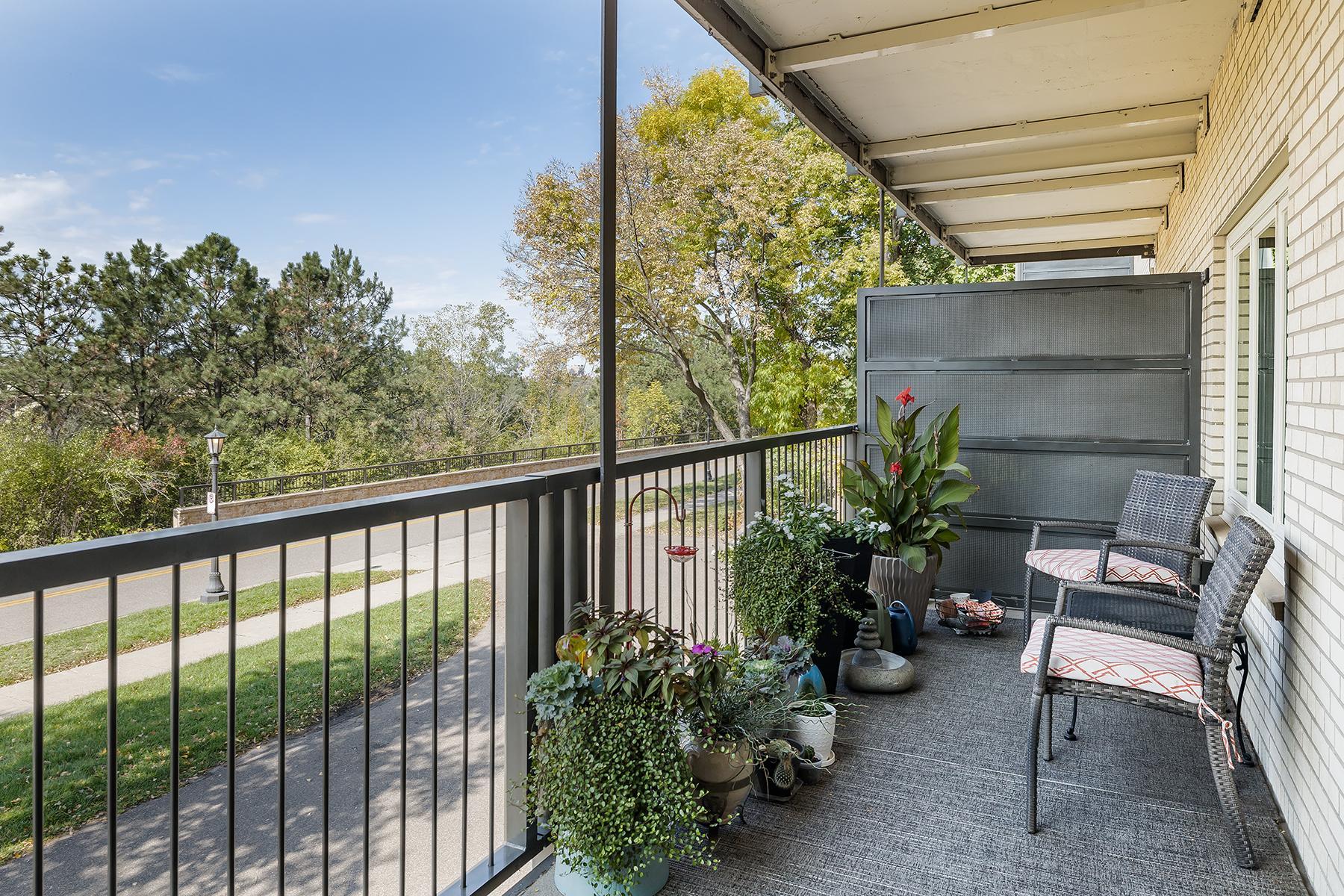 Private balcony is longer than other units (22x6 ft). Faces west with river bluff views!
