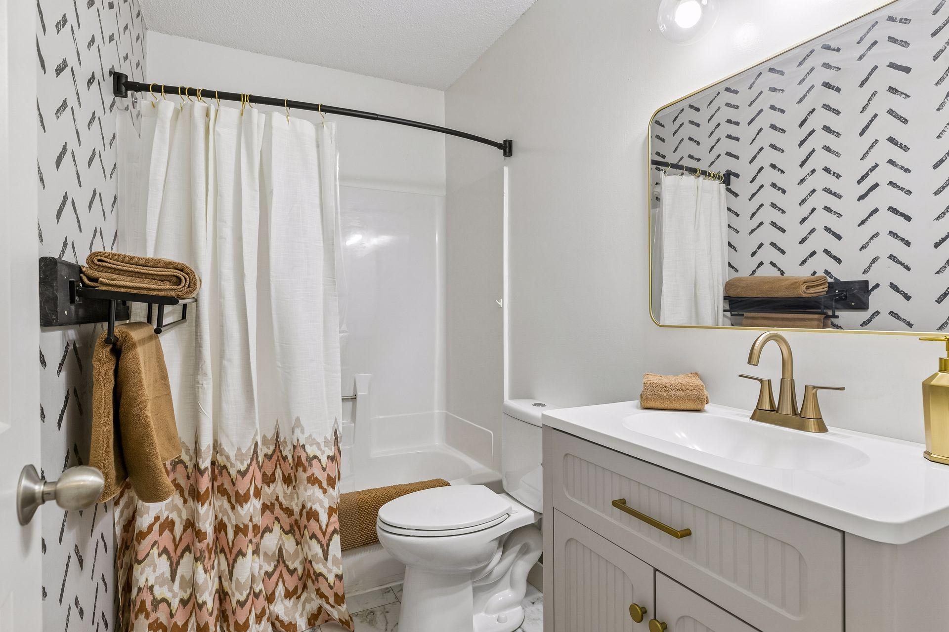 Full upstairs bathroom, remodeled to impress guests.