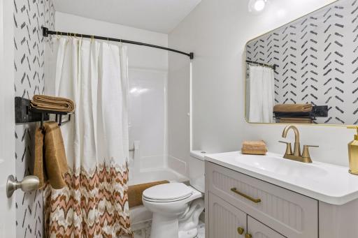 Full upstairs bathroom, remodeled to impress guests.