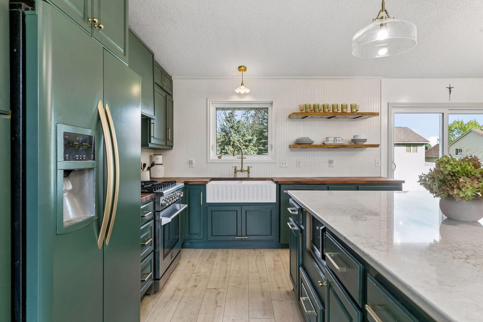 Farmhouse apron sink and European faucet complete this English cottage remodel.