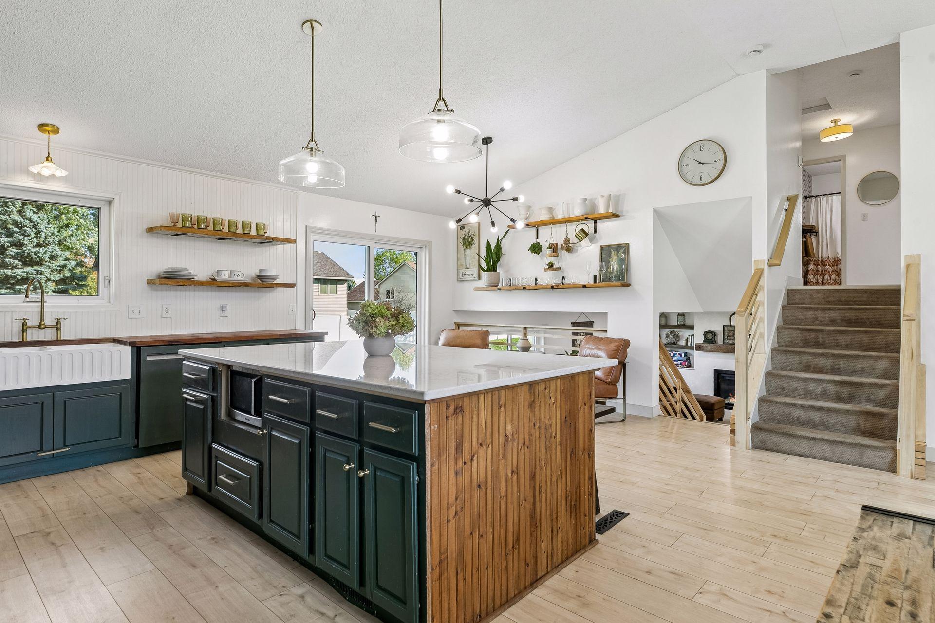 Lovers of open concept, check out your views to the upper and lower levels.