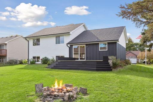 Deck flows effortlessly into the yard, making spending time with friends or children so much more enjoyable.