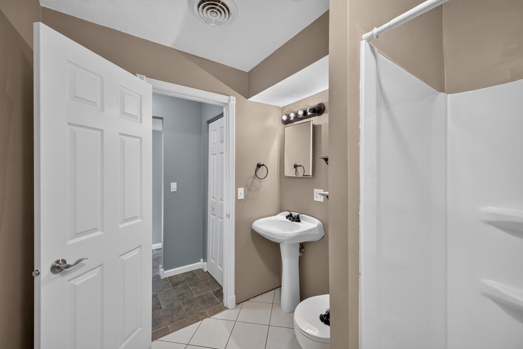 Additional storage closet off of bathroom.