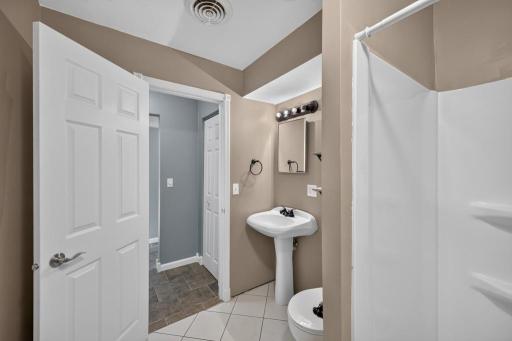 Additional storage closet off of bathroom.