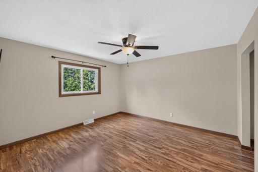 Spacious bedroom easily accommodates a king size bed.