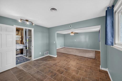 This additional room could be used for an exercise room or would be great for a pool table!