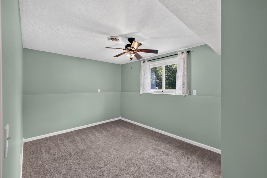 One of two spacious bedrooms in lower level.