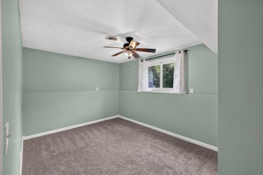 One of two spacious bedrooms in lower level.